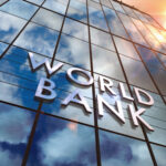 World Bank on glass building. Mirrored sky and city modern facade. Global capital, business, finance, economy, banking and money concept 3D rendering illustration.